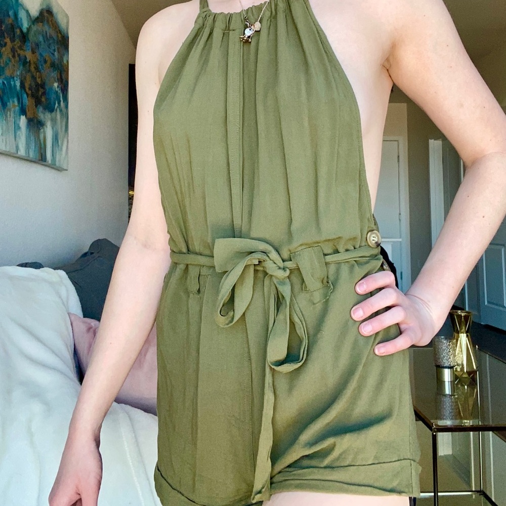 Green halter romper with open back
